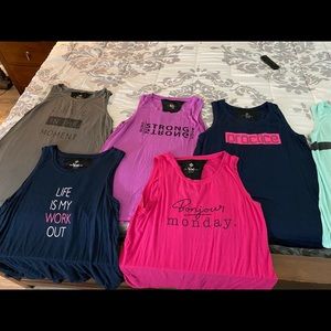 Women’s LuLa Roe size medium workout tops in very good condition.